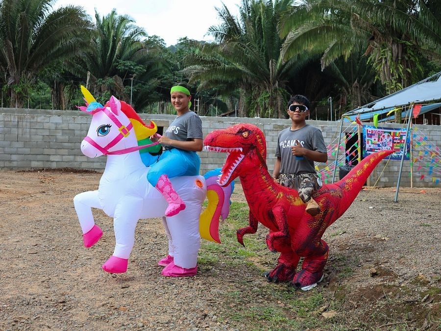 Junior campers racing in inflatable costumes