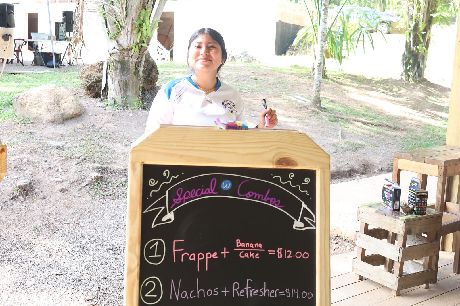 Young woman at the Snack Shack menu board