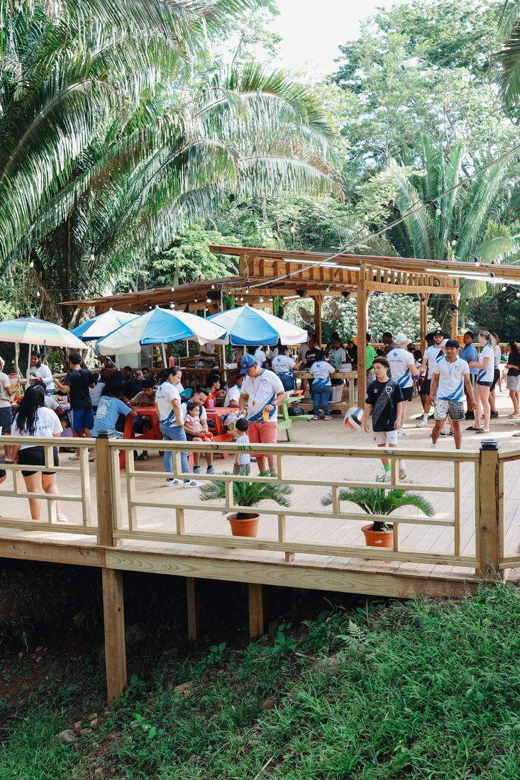 Raised deck with umbrellas overlooking the grounds