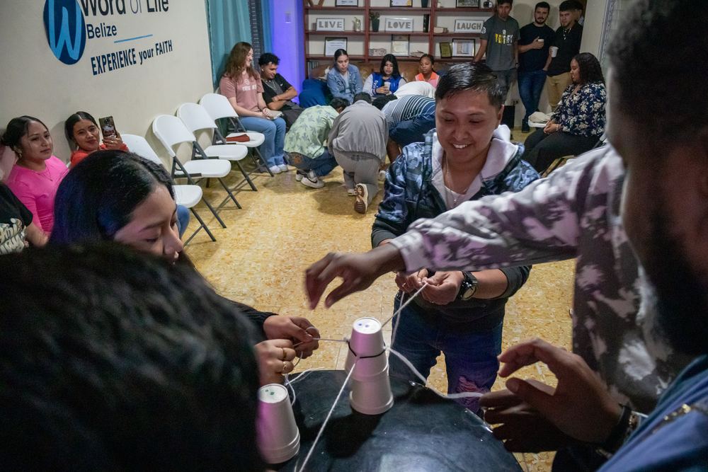 Young adults playing a team-building game